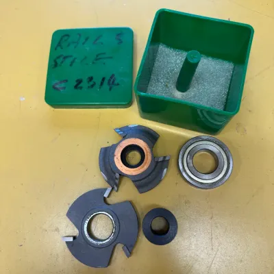 CMT rail and stile shaper cutter set, model C2314, with green plastic storage case.
