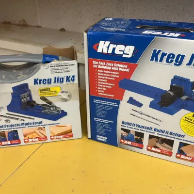 Kreg Jig K4 and Kreg Jig K5 pocket hole joinery systems in their original retail packaging.