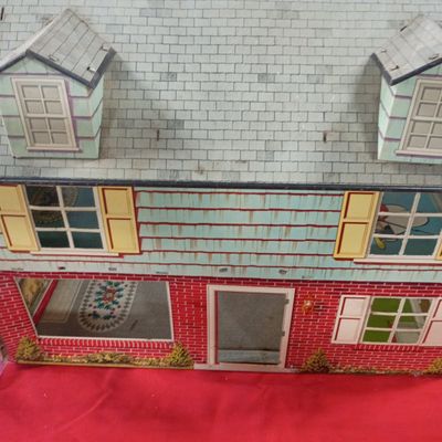 Sale Photo Thumbnail #60: Two Story Lithographed Tin Colonial Dollhouse with Plastic Furniture