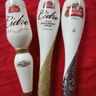 Sale Photo Thumbnail #42: A Trio of Stella Artois and Stella Artois Cidre Ceramic Beer Tap Handles
