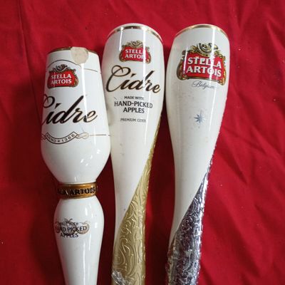 Sale Photo Thumbnail #43: Trio of Stella Artois Ceramic Beer and Cidre Tap Handles