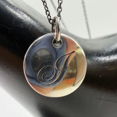 Sale Photo Thumbnail #148: Tiffany and Co. Letter J Initial Alphabet Disc Charm Pendant Necklace Sterling Silver AG925