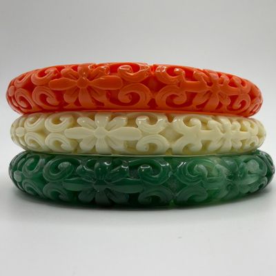 Sale Photo Thumbnail #226: Kenneth Jay Lane Faux Jade Coral Ivory Tone Molded Lucite KJL Bangle Set