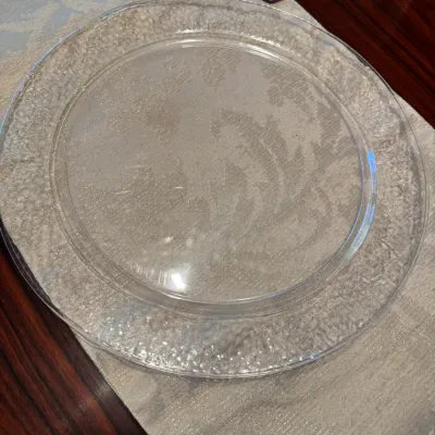 Sale Photo Thumbnail #271: Vintage clear pressed glass serving platter featuring a textured, pebbled rim design.