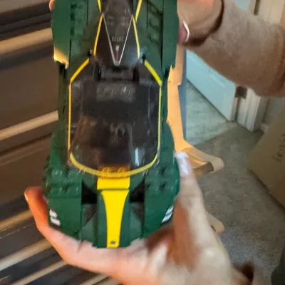 Lego Speed Champions Lotus Evija toy car in green and yellow, fully assembled and in good condition.