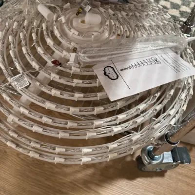 Trim A Home collapsible spiral Christmas tree light decoration, complete with owner's manual and original accessories.