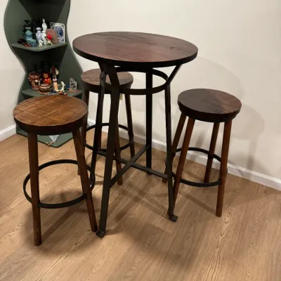 Rustic industrial pub table set featuring a round dark wood top on a black metal base, accompanied by three matching wooden barstools...