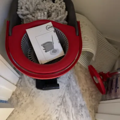 Sale Photo Thumbnail #122: O-Cedar EasyWring spin mop and bucket system with instruction manual, mop head, and accessories.