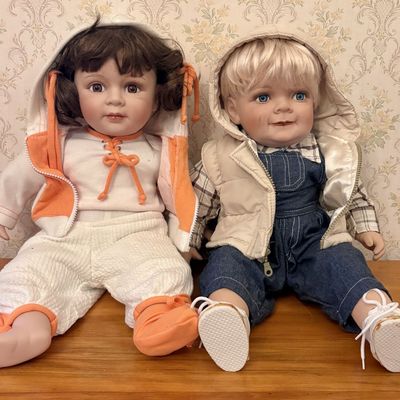 Sale Photo Thumbnail #390: A Pair of Royal Cathay Collection Limited Edition Porcelain Contemporary Dolls