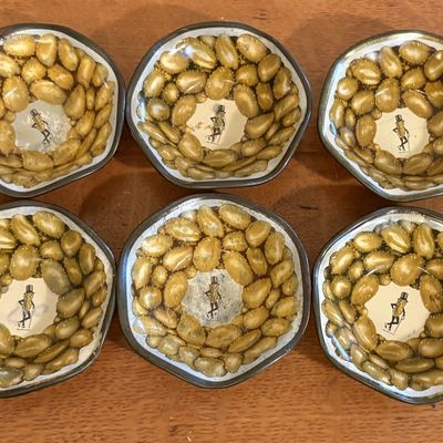 A Set of Six Vintage Planters Mr. Peanut Lithographed Tin Nut Bowls