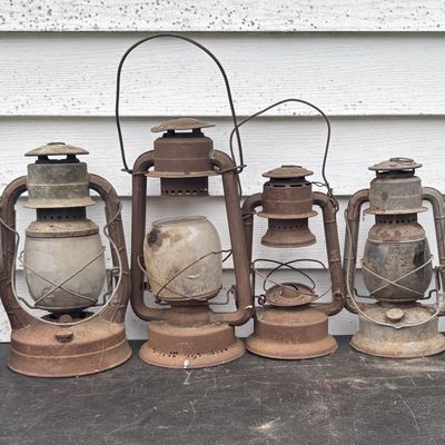 Sale Photo Thumbnail #781: A Collection of Vintage and Antique Metal Lanterns Including Coleman and Little Wizard