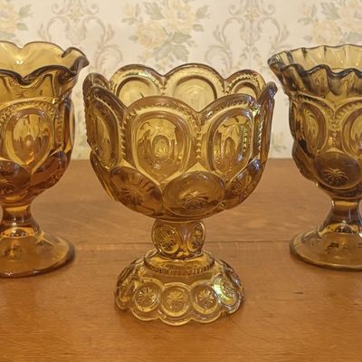 A Trio of Amber Pressed Glass Footed Vessels in the Moon and Star Pattern
