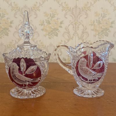 Sale Photo Thumbnail #110: A Pair of Ruby Stained Cut Crystal Bird Motif Sugar Bowl and Creamer