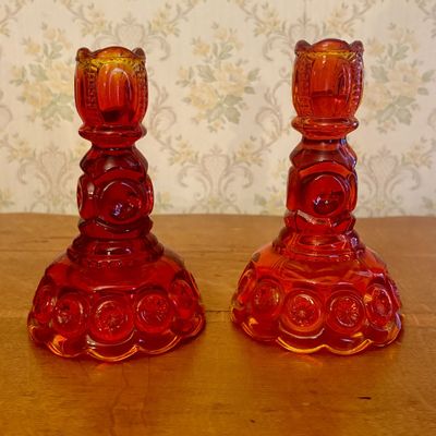 A Pair of Amberina Glass Moon and Star Candlesticks