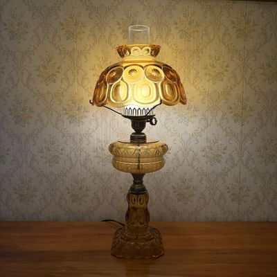 Sale Photo Thumbnail #316: Amber Pressed Glass Moon and Star Pattern Electric Table Lamp
