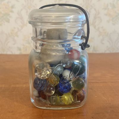 Sale Photo Thumbnail #139: A Collection of Vintage Glass and Clay Marbles in a Ball Ideal Glass Canning Jar
