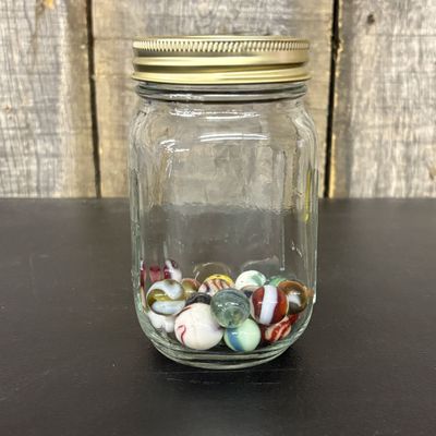 Sale Photo Thumbnail #426: A Collection of Vintage Glass Marbles in a Glass Mason Jar