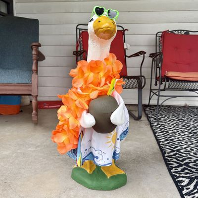 Sale Photo Thumbnail #816: Large Painted Cast Concrete Porch Goose Statue in Hawaiian Themed Outfit