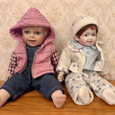 Sale Photo Thumbnail #391: A Pair of Limited Edition Cathay Collection Porcelain Headed Dolls