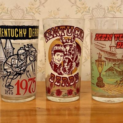 Sale Photo Thumbnail #393: A Collection of Five Official Kentucky Derby Souvenir Mint Julep Glasses