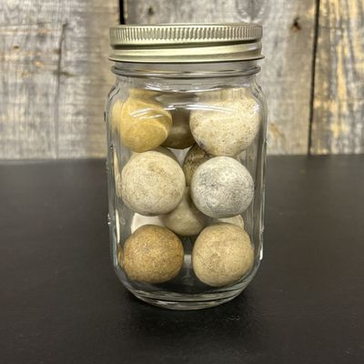 Sale Photo Thumbnail #430: A Collection of Vintage Clay and Stoneware Marbles
