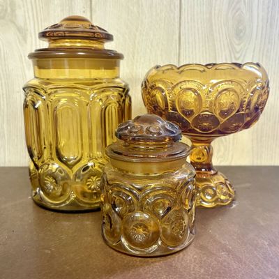Sale Photo Thumbnail #694: Three Pieces of Amber Moon and Star Pattern Pressed Glass