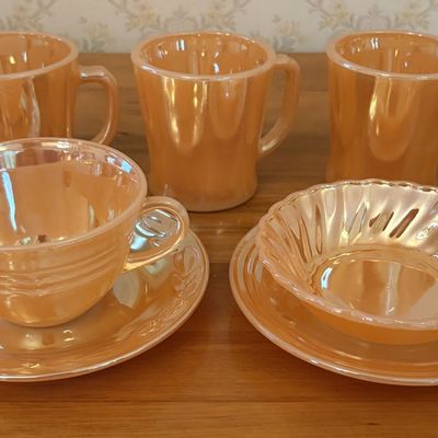 Sale Photo Thumbnail #445: A Collection of Fire-King Peach Lustre Oven Resistant Glassware