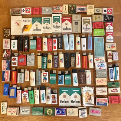 Sale Photo Thumbnail #250: Large Collection of Vintage Tobacco Ephemera Including Cigarette Packs, Lighters, and Matchboxes