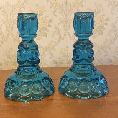 A Pair of Blue Pressed Glass Moon and Star Candlesticks
