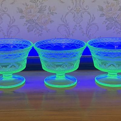 Sale Photo Thumbnail #478: A Set of Five Green Uranium Depression Glass Footed Sherbet Cups in the Cameo Ballerina Pattern