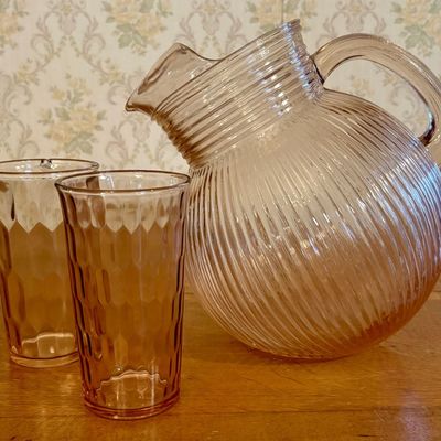 A Pink Depression Glass Ball Pitcher and Two Coordinating Honeycomb Tumblers