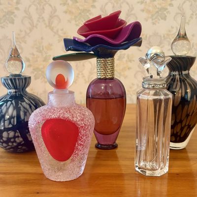 Sale Photo Thumbnail #456: An Assortment of Five Decorative Art Glass and Designer Perfume Bottles