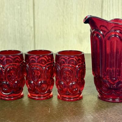 Sale Photo Thumbnail #689: A Set of Moon and Star Pattern Ruby Red Pressed Glass Pitcher and Individual Tumblers