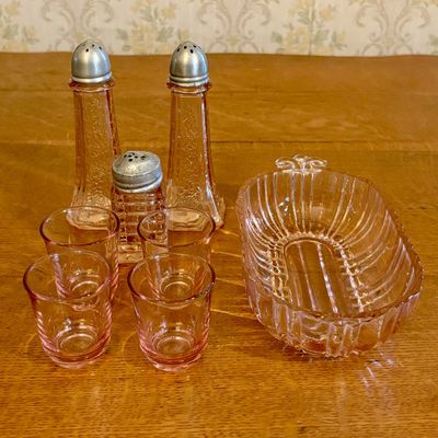 A Collection of Pink Depression Glass Tableware Including Hazel-Atlas Glasses and Floral Pattern Shakers