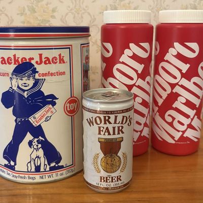 Sale Photo Thumbnail #533: A Collection of Vintage Advertising Containers Including Cracker Jack Borden and Marlboro