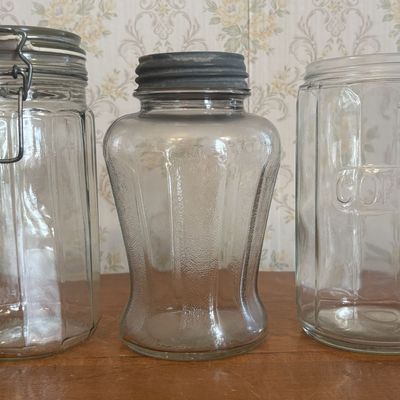 Sale Photo Thumbnail #272: Three Vintage Clear Glass Kitchen Jars Including Kraft and Coffee Embossed Examples