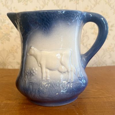 Sale Photo Thumbnail #262: Lincoln Day Signed Blue and White Stoneware Cow Pitcher Dated 1982