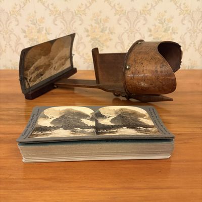 Sale Photo Thumbnail #384: Antique Wood Holmes Style Stereoscope with a Collection of Stereoview Cards
