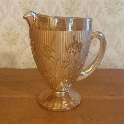 Sale Photo Thumbnail #102: Marigold Iridescent Iris and Herringbone Pattern Glass Footed Pitcher