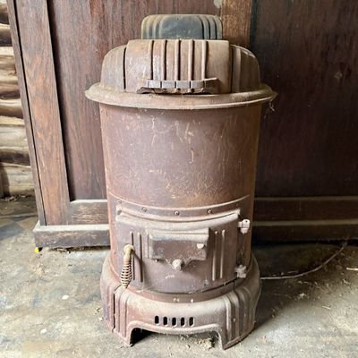 Sale Photo Thumbnail #790: Vintage Stiglitz Warm-Aire Cast Iron Parlor Stove Model 4716