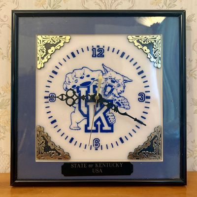 Sale Photo Thumbnail #628: University of Kentucky Wildcats Framed Wall Clock with 1990s Logo