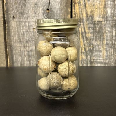 Sale Photo Thumbnail #307: A Collection of Antique Clay Marbles in a Glass Storage Jar