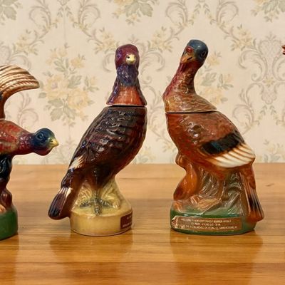 Sale Photo Thumbnail #334: A Collection of Wild Turkey Austin Nichols Ceramic Miniature Whiskey Decanters