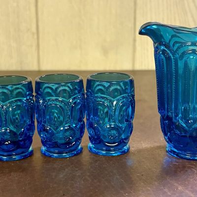 Sale Photo Thumbnail #706: A Set of Five Blue Pressed Glass Moon and Star Pattern Miniature Tableware Items