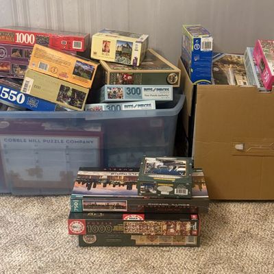 Sale Photo Thumbnail #418: A Large Collection of Assorted Jigsaw Puzzles Featuring Buffalo Games, Educa, Cobble Hill, and Others