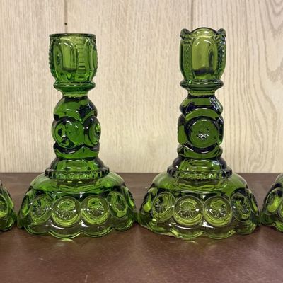 Sale Photo Thumbnail #687: A Set of Four Green Moon and Star Pattern Pressed Glass Candlesticks
