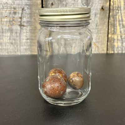 Sale Photo Thumbnail #437: Three Antique Glazed Clay Marbles