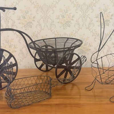 Sale Photo Thumbnail #514: A Trio of Decorative Wirework Animal Baskets and a Tricycle Planter
