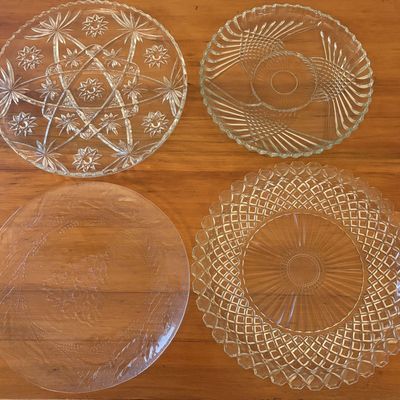 Sale Photo Thumbnail #585: A Collection of Four Pressed Glass Serving Platters and Divided Relish Dishes