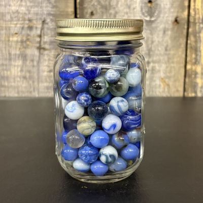 Sale Photo Thumbnail #665: A Collection of Assorted Glass Marbles in a Glass Canning Jar